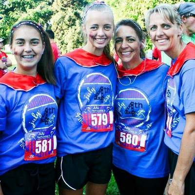 Runners sporting FireKracker 5k shirts.